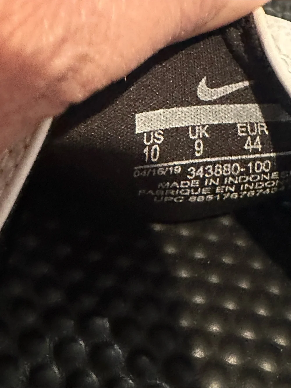 Nike Black and White Slide Sandals with Textured Footbed